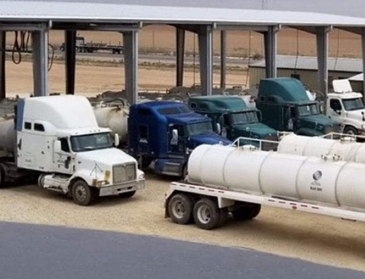 A fleet of Milestone transport trucks.